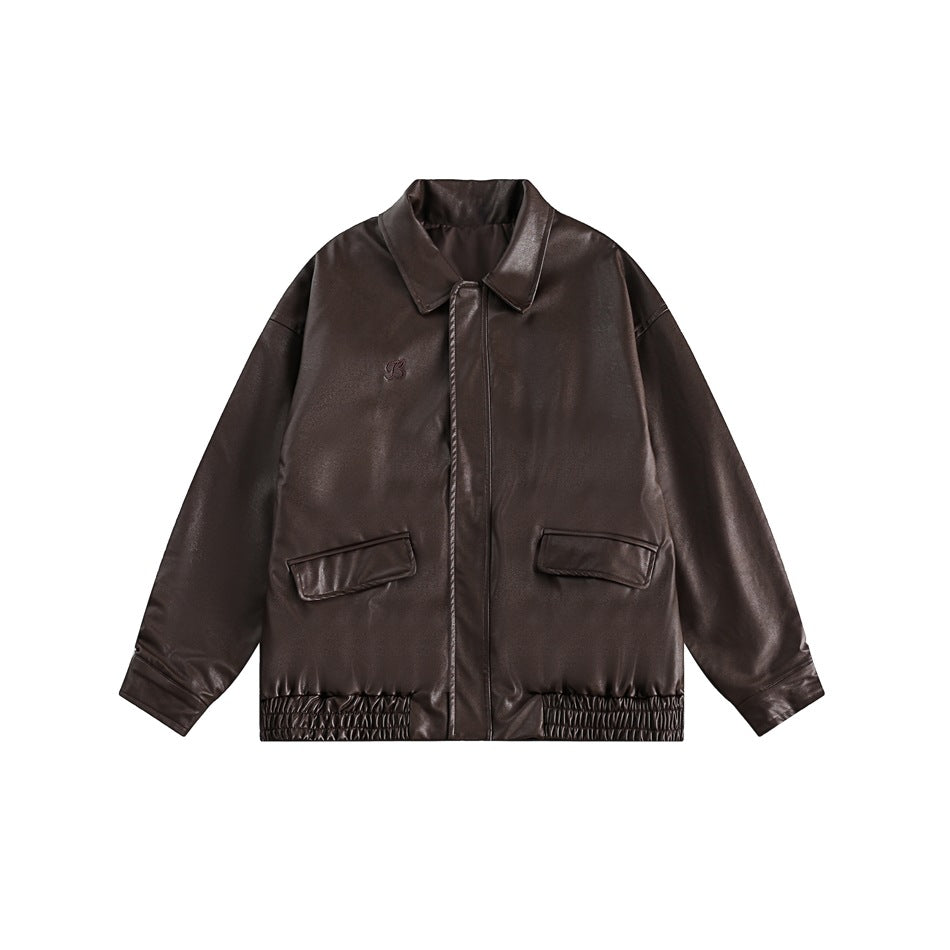 Coffee brown glossy faux-leather jacket with collar, two flap pockets and gathered hem, flat lay front view