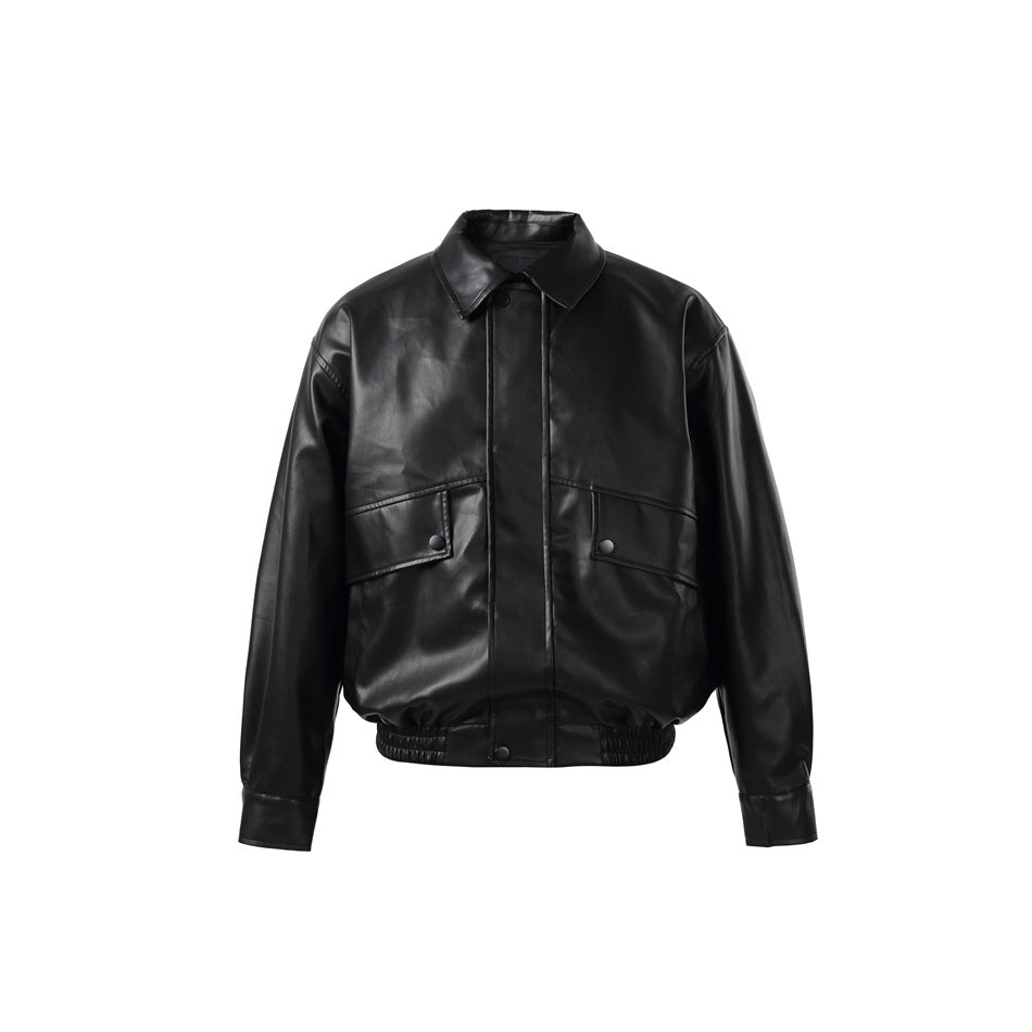 Black faux-leather-look bomber jacket, front view, with collar, flap pockets and elastic hem
