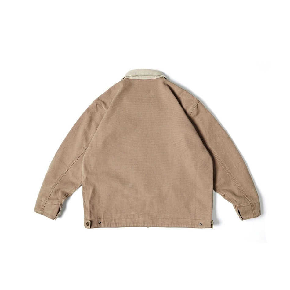 Back view of a tan collared jacket with long sleeves and adjustable snap tabs at the hem.
