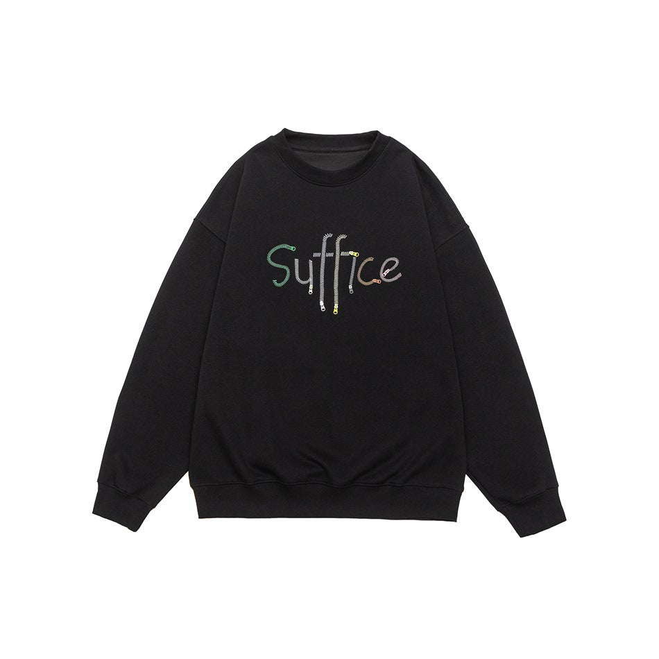 Black crew-neck sweatshirt flat lay with ribbed trim and colorful zipper-style lettering graphic on chest
