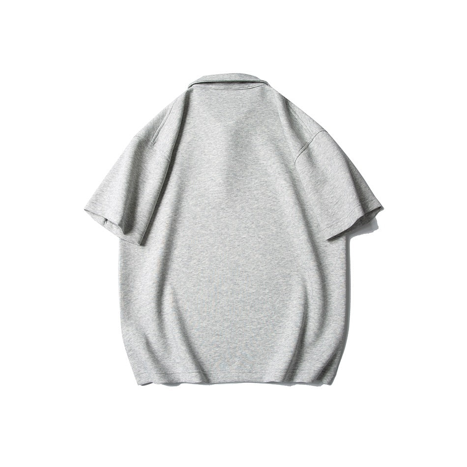 Back view of a plain light heather-gray short-sleeve polo shirt laid flat.