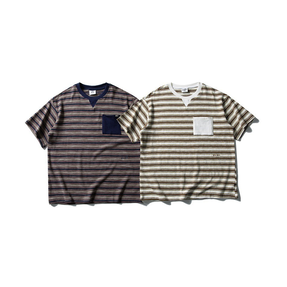 Two short-sleeve striped T-shirts shown from the front: one dark navy with a navy pocket, the other cream with a white