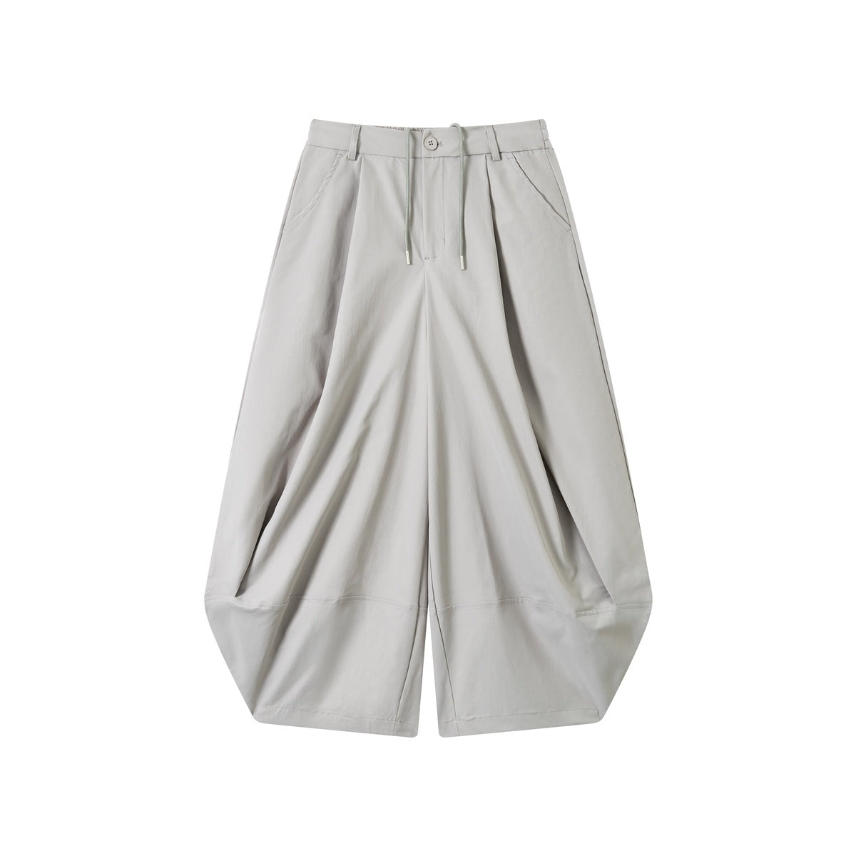 Light gray wide-leg balloon pants with front pleats, drawstring, button closure and curved lower leg panel, flat lay front