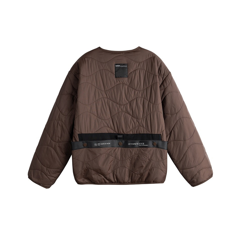 Back view of a brown quilted jacket with wavy stitching, long sleeves and a black snap-fastened waist strap.