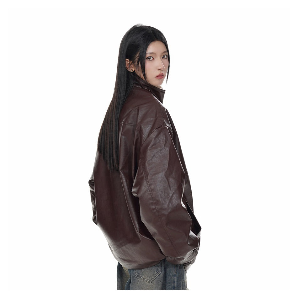 Model in a dark brown jacket, shown from a rear three-quarter angle.