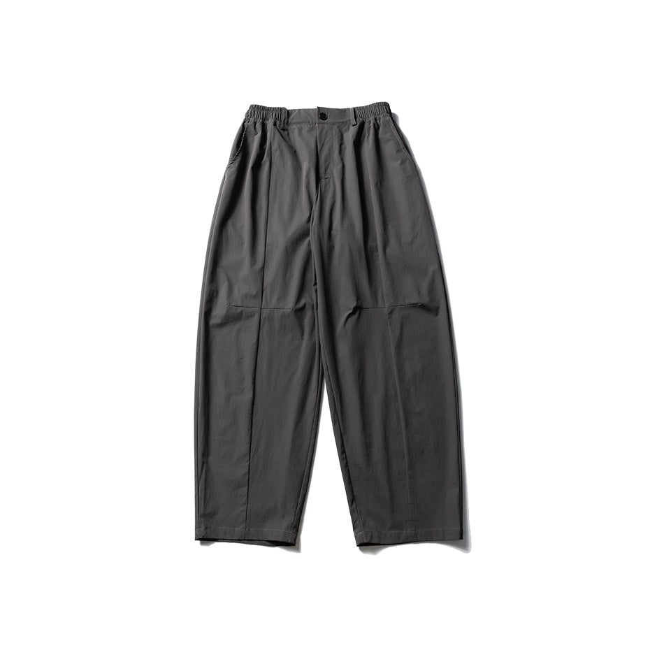 Gray wide-leg pants with elastic waistband and center button, flat lay front view