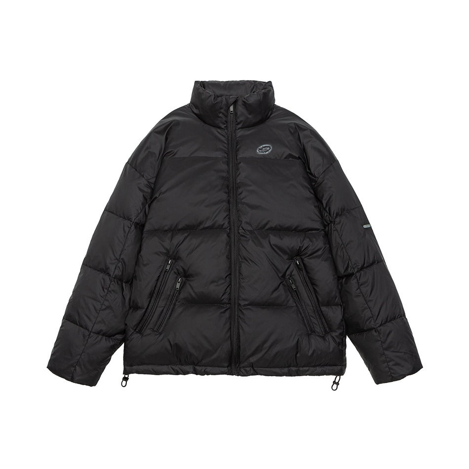 Black quilted puffer jacket with stand collar, front zip, diagonal zip pockets and drawcord hem, flat front view