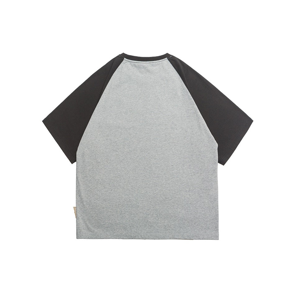 Back view of a heather-gray raglan T-shirt with black sleeves.