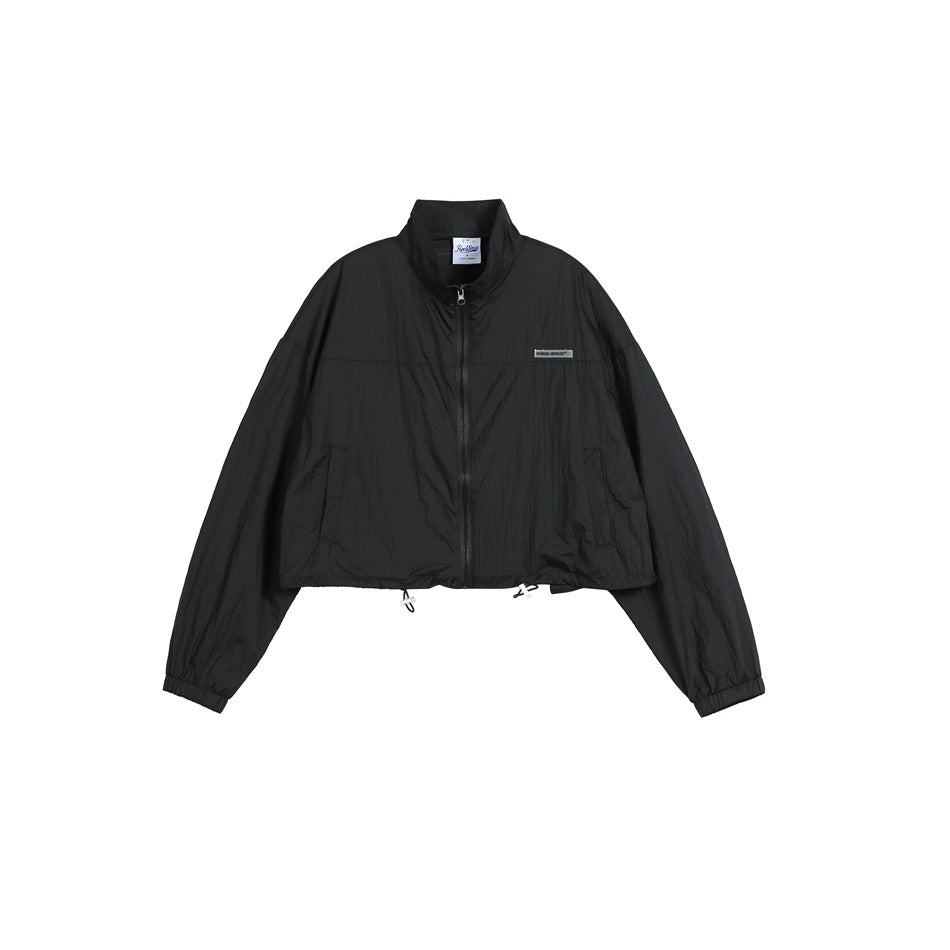 Black cropped zip-up jacket with stand collar, drawstring hem and elastic cuffs, flat front view