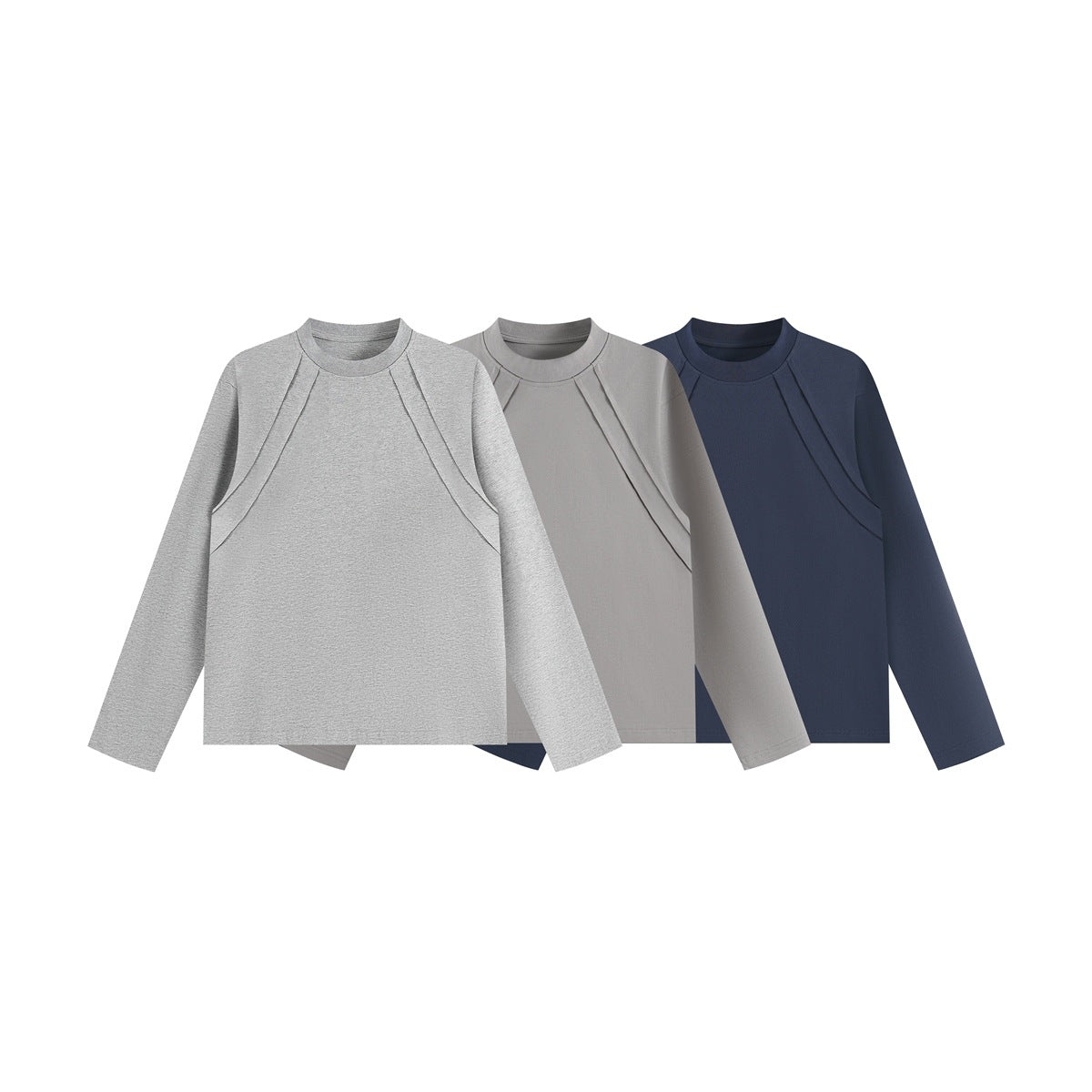 Three long-sleeve crew-neck shirts with curved front seam details in light gray, taupe, and navy.
