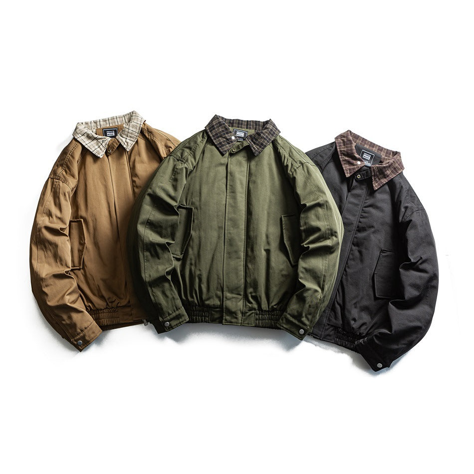Three front views of collared jackets in tan, olive, and black, with plaid collars and elastic hems.