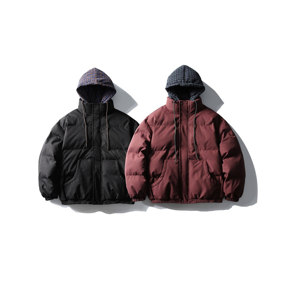 Two hooded jackets shown from the front: one black and one burgundy, both with plaid-lined hoods.