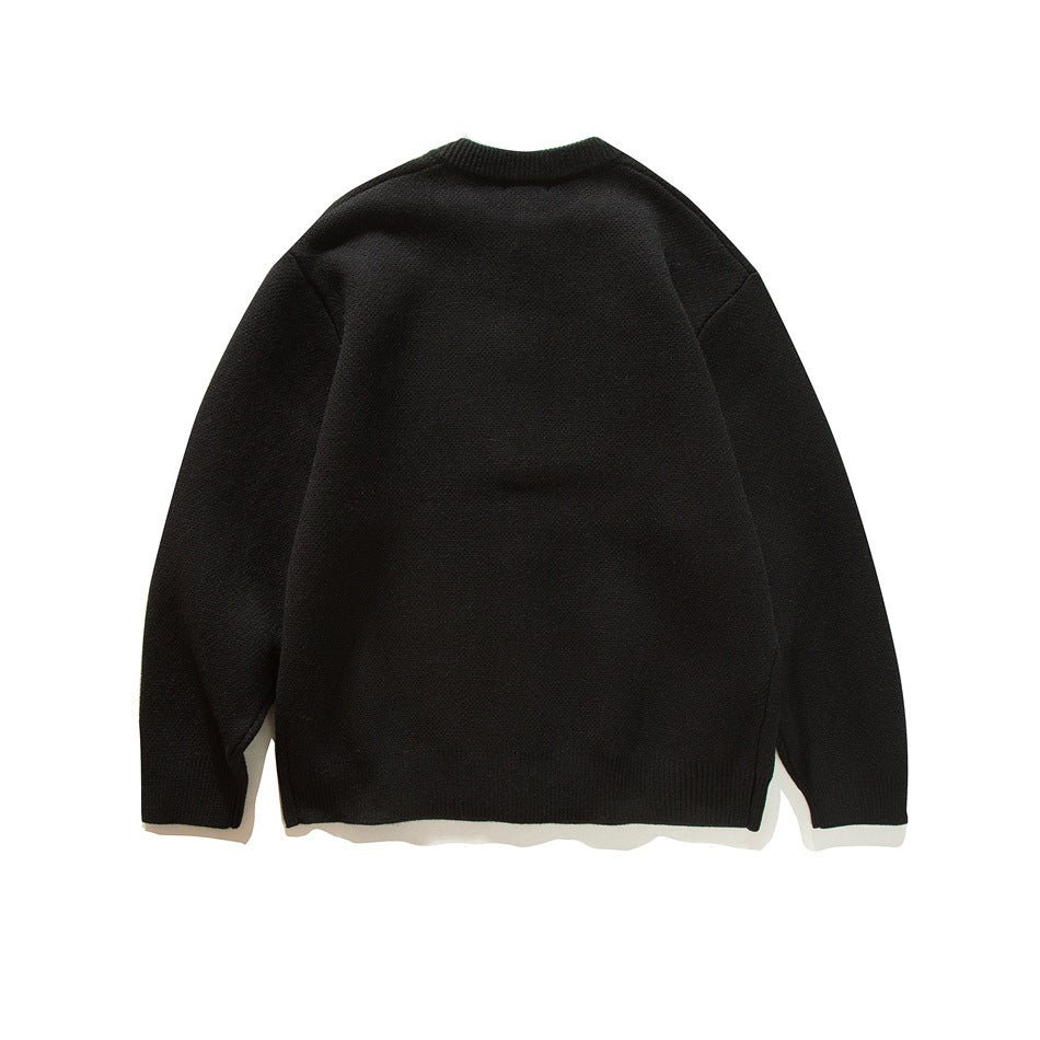 Back view of a black knit cardigan with long sleeves and ribbed collar, cuffs, and hem.