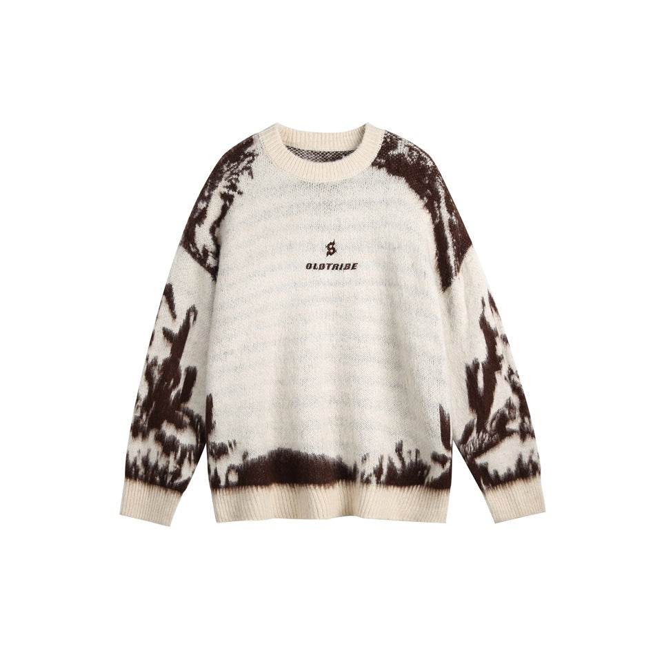 Off-white crewneck knit sweater with dark brown plant-like graphic on shoulders, sleeves and hem, front view