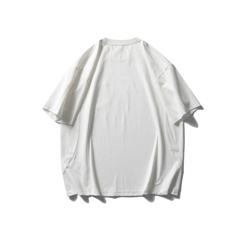 Back view of an oversized white T-shirt with short sleeves on a white background.