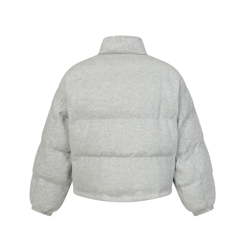 Back view of a light gray heather jacket with a tall collar, long sleeves, and horizontal quilted panels.