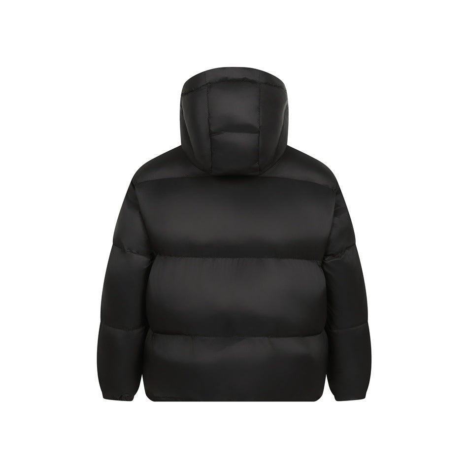 Black hooded puffer jacket, back view, showing quilted hood, horizontal channels and elastic cuffs