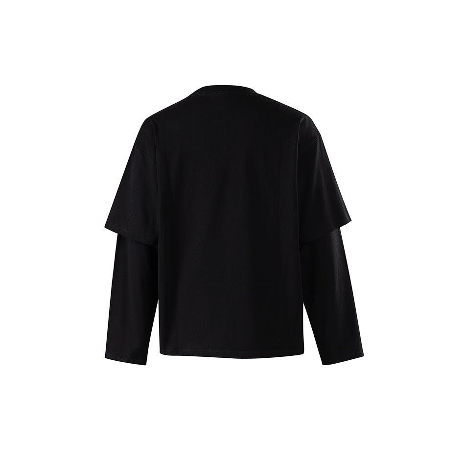 Back view of black layered long-sleeve top with plain back and crew neck