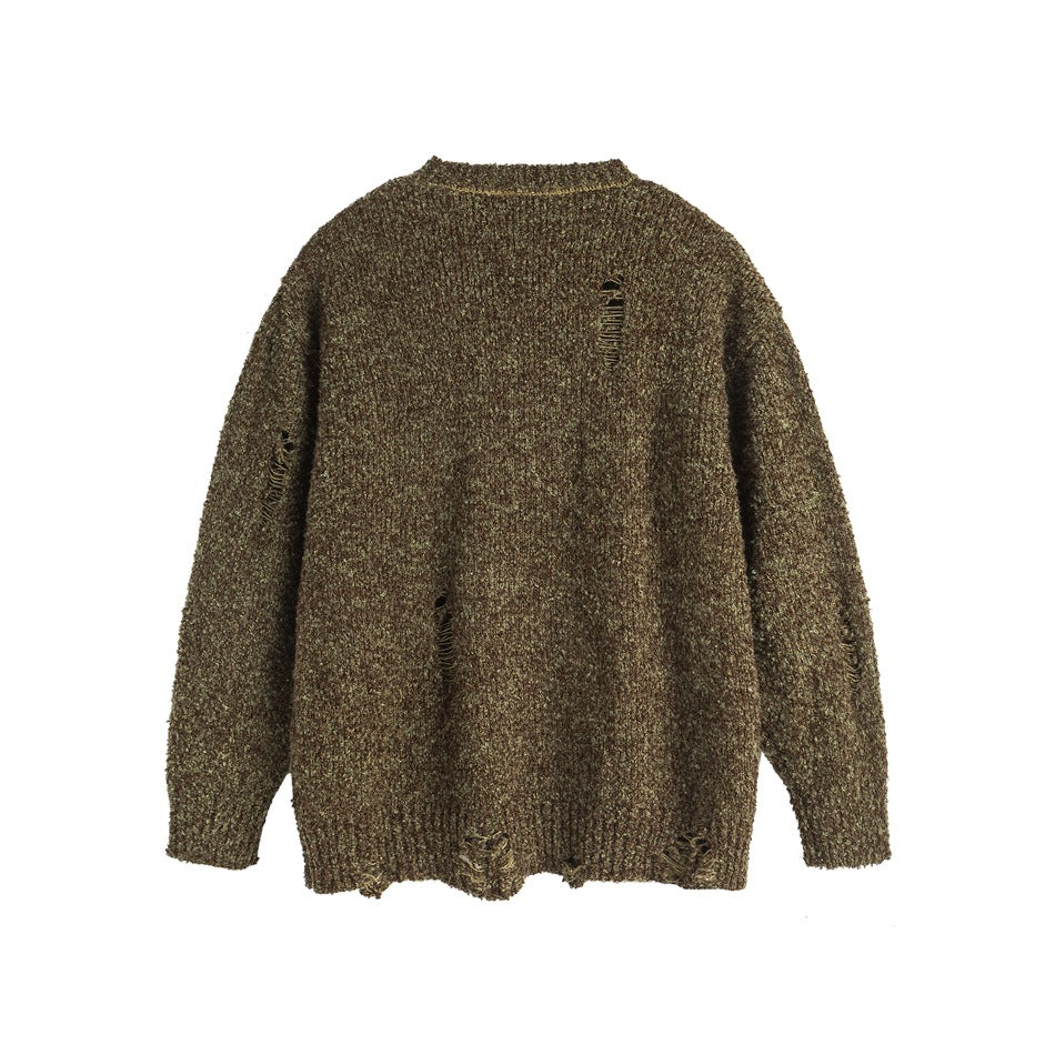 Back view of an olive-brown marled sweater with distressed slits and a ribbed hem.
