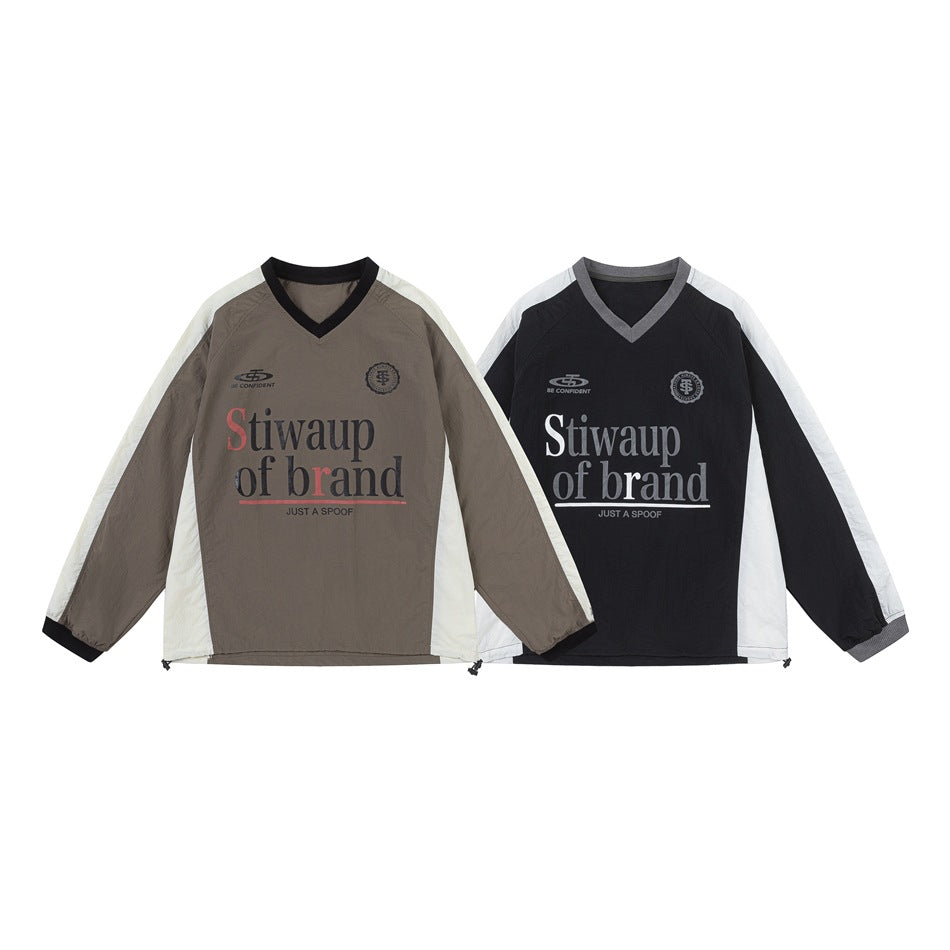 Two V-neck pullovers shown side by side: taupe with cream panels and black with white panels.