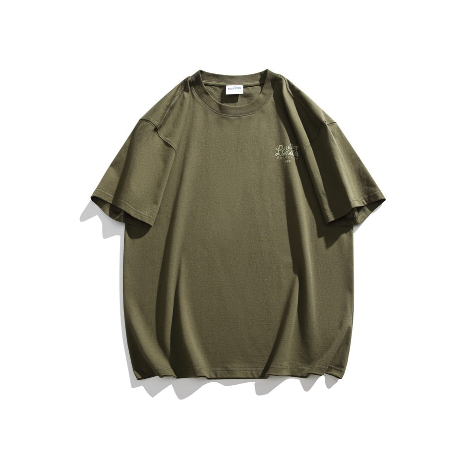 Front of an olive green T-shirt with a small light-colored script logo on the left chest.