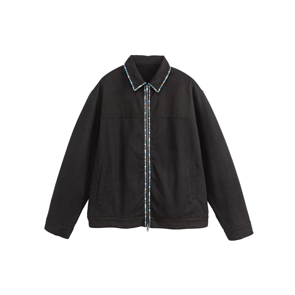 Black zip-front collared jacket with multicolor trim on the collar and zipper, flat lay front view