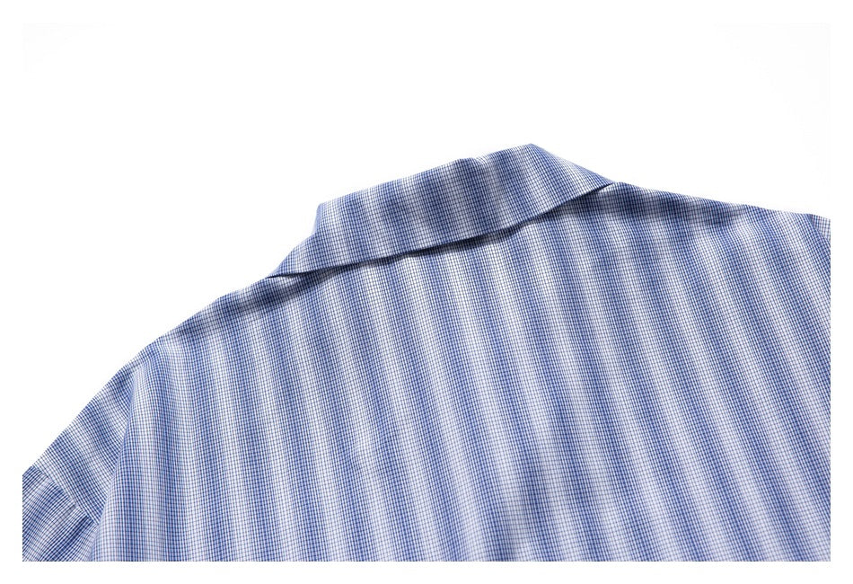 Cropped flat view of the back of a blue-and-white checked shirt, showing its collar and shoulder area.