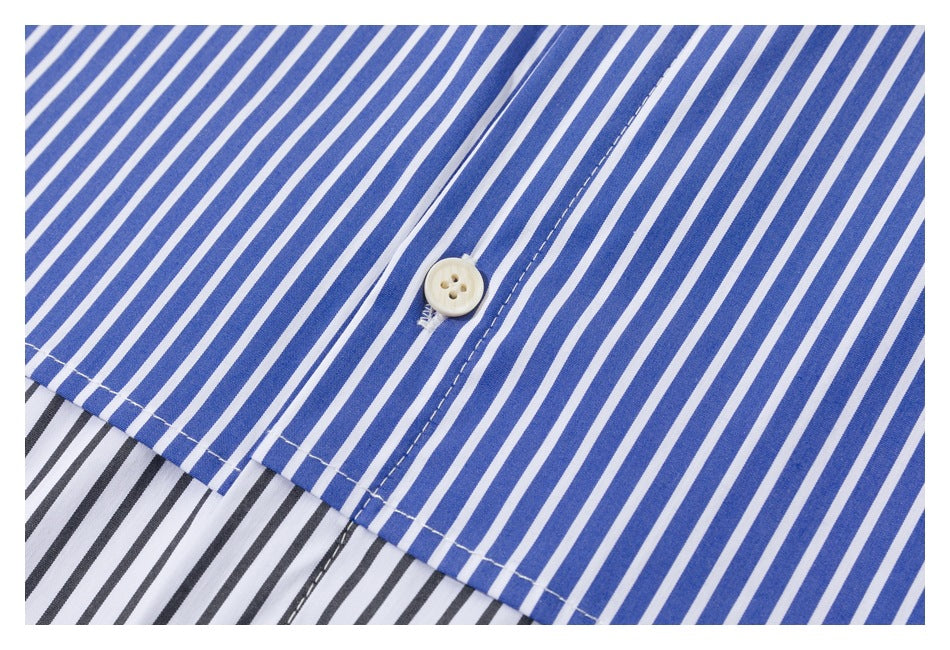 Close-up of blue-and-white striped shirt fabric, a white button, and the edge of contrasting black-and-white stripes.