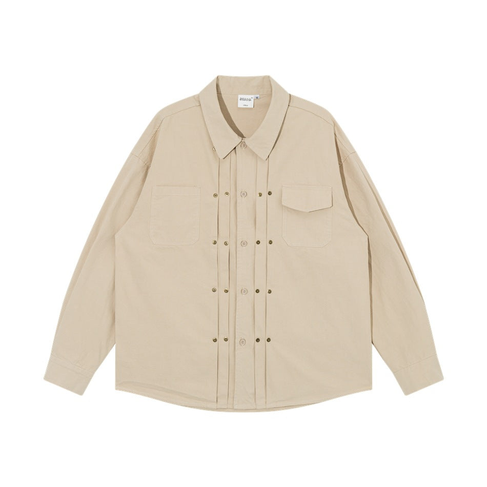 Khaki long-sleeve shirt with pleated front, brass studs, pointed collar and two chest pockets, flat lay