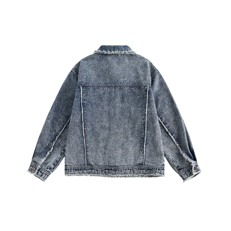 Back view of a blue acid-wash denim jacket with a panel seam and frayed trim at the collar, cuffs and hem.