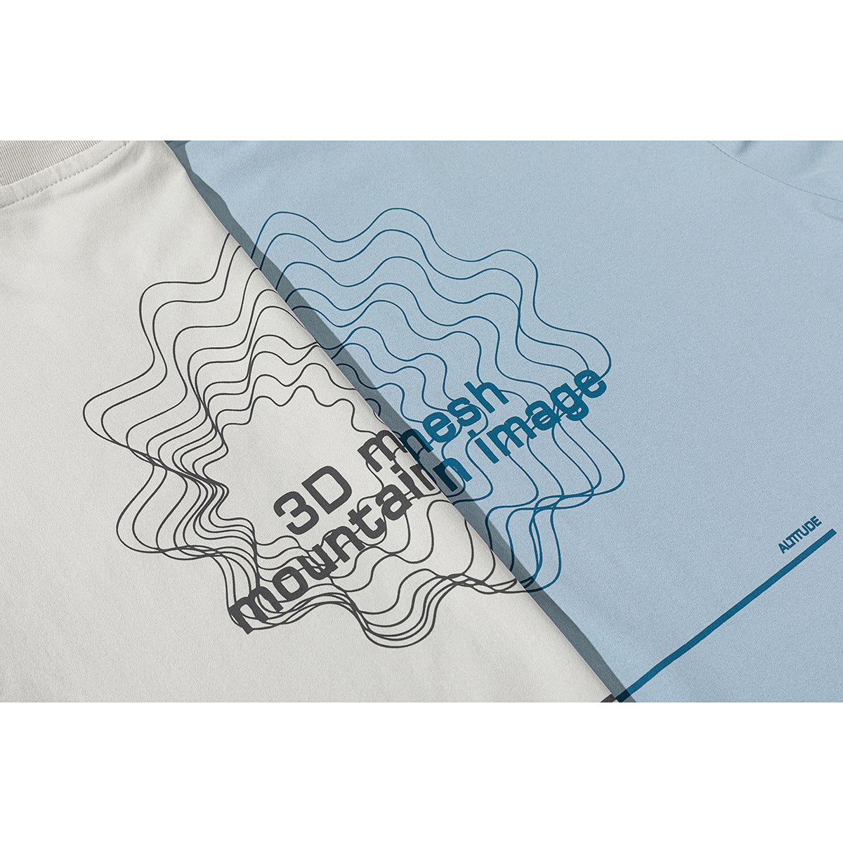 Close-up of gray and blue T-shirts with wavy line graphics and English text printed on the fronts.