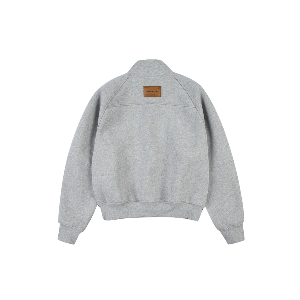 Back view of a light gray sweatshirt with raglan seams, ribbed cuffs and hem, and a small tan neck patch.