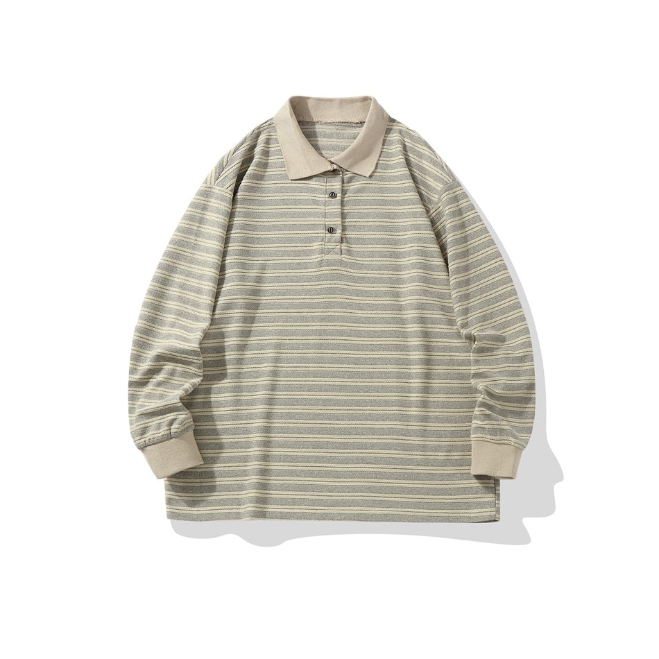 Front flat lay of a gray and khaki striped long-sleeve polo top with khaki collar, two buttons and ribbed cuffs