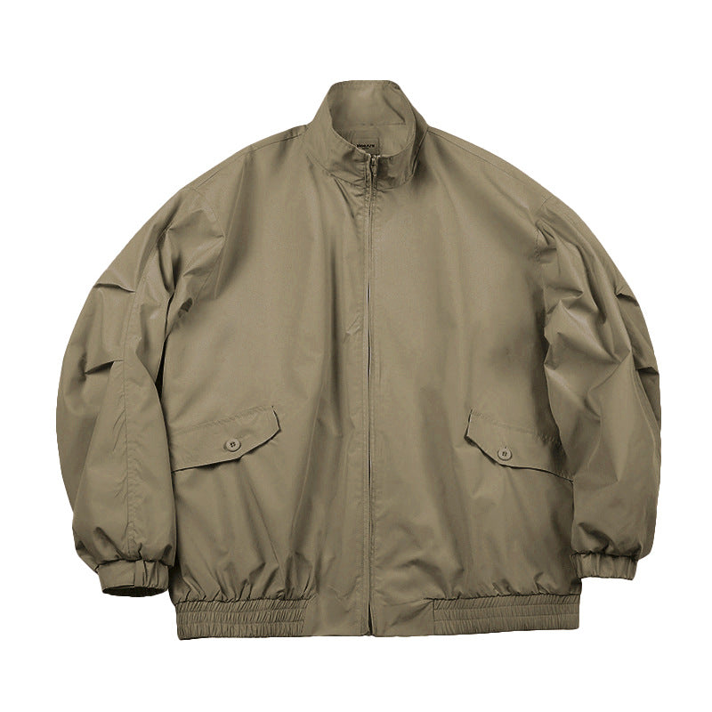 Khaki green stand-collar zip jacket with flap pockets and elastic cuffs, flat lay front view