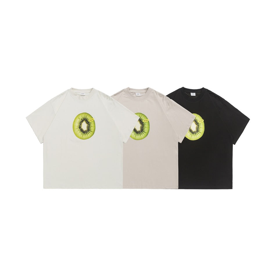 Three short-sleeve crew-neck T-shirts in white, beige, and black with kiwi prints on the chest.