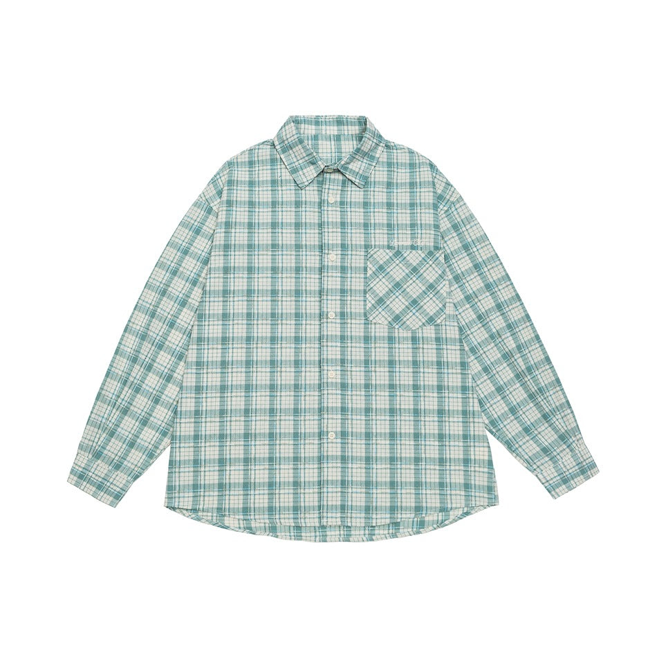Green and cream plaid long-sleeve button-up shirt flat lay with chest pocket and pointed collar