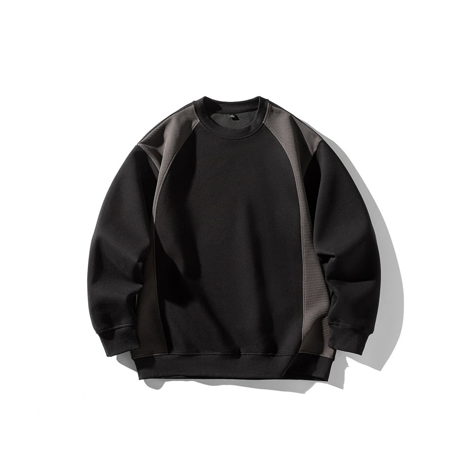 Black crewneck sweatshirt with dark gray ribbed raglan side panels, flat lay front view