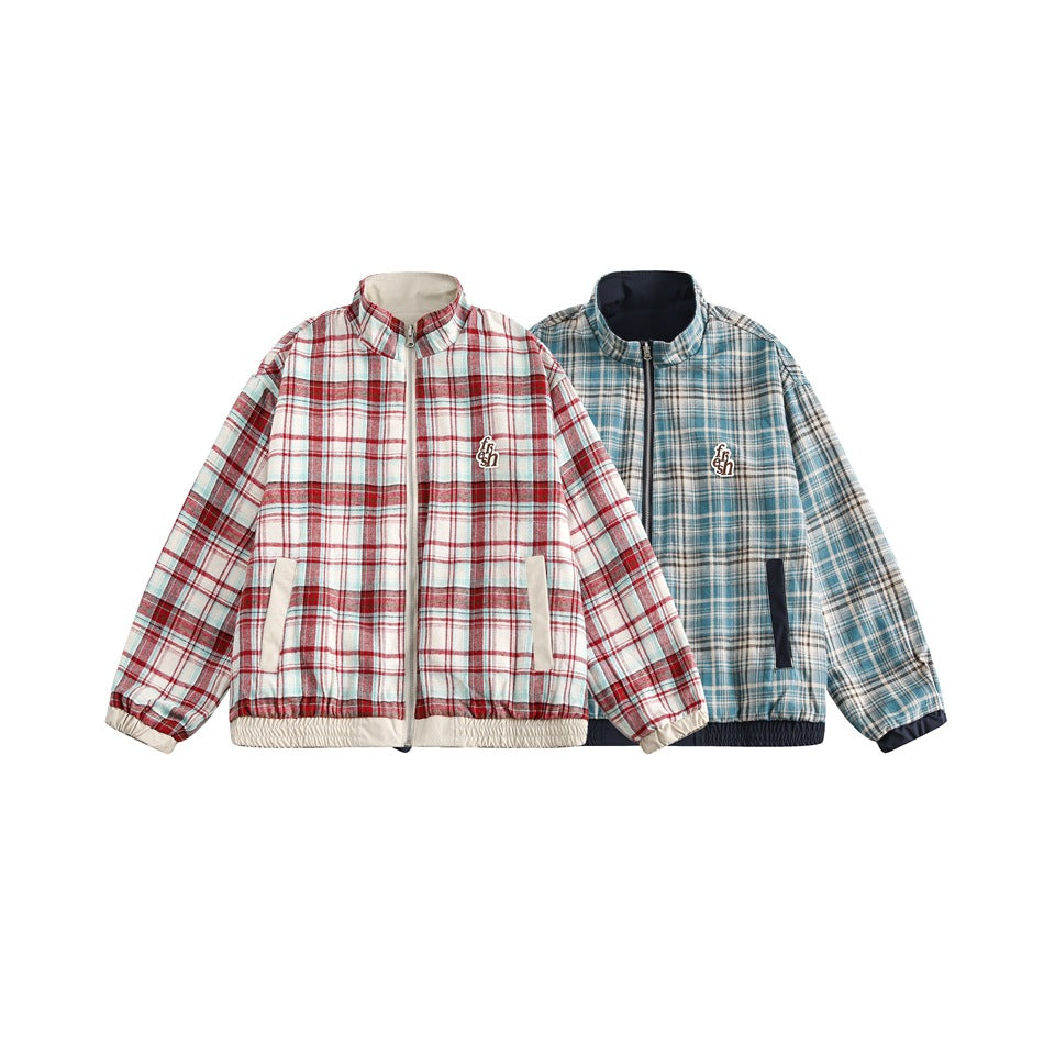 Two zip-front plaid jackets shown from the front: one red, cream, and pale blue; the other blue and cream.
