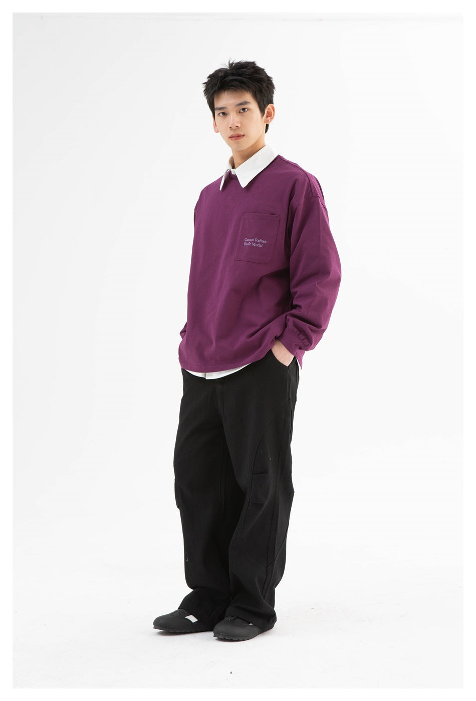 Full-length model wearing a plum long-sleeve shirt with a white collar and chest pocket, paired with black pants.