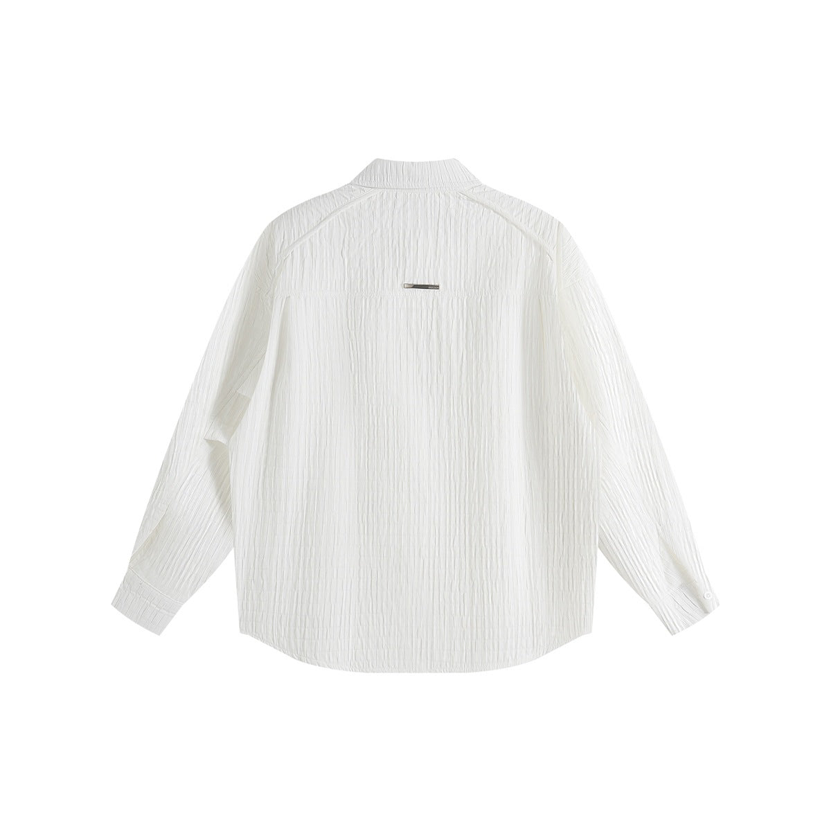 Back view of a white long-sleeve shirt with a pointed collar, curved hem, and small metal detail.