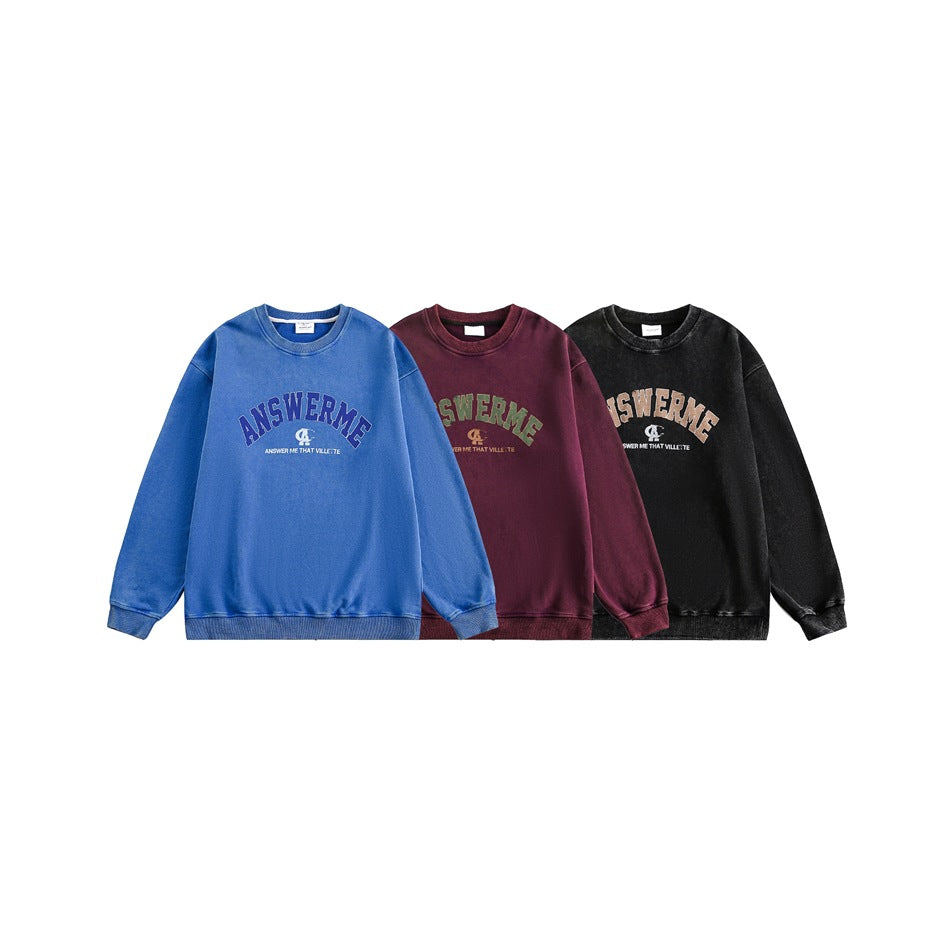 Three crewneck sweatshirts shown together in blue, burgundy, and black, each with a large arched chest graphic.