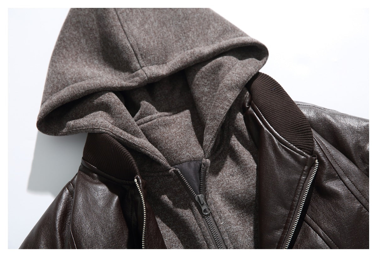 Close-up of a dark brown jacket with a heathered gray-brown hood and inner zip layer.