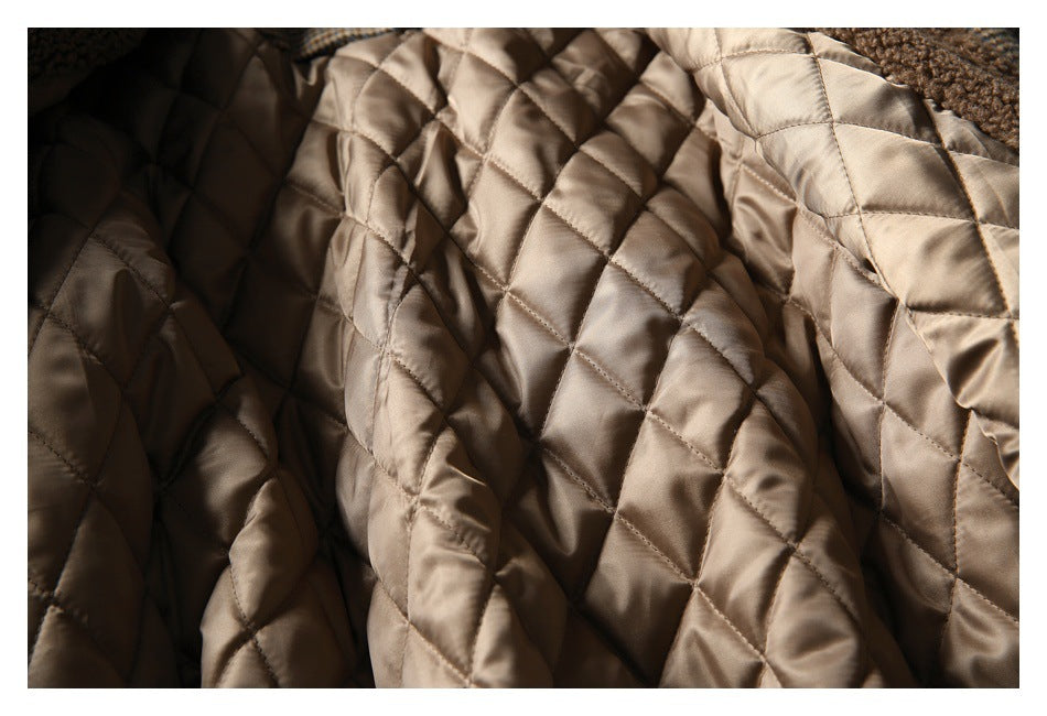 Close-up of the coat's smooth tan diamond-quilted lining.