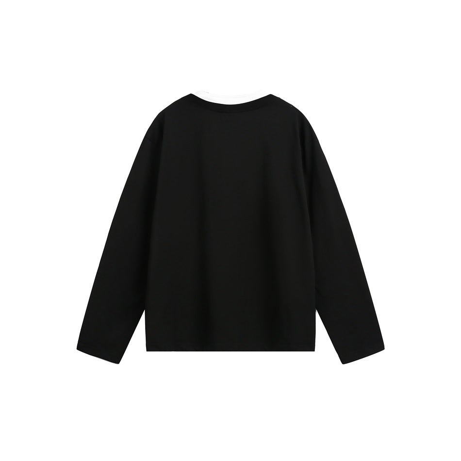 Back view of a black long-sleeve top laid flat on a white background.