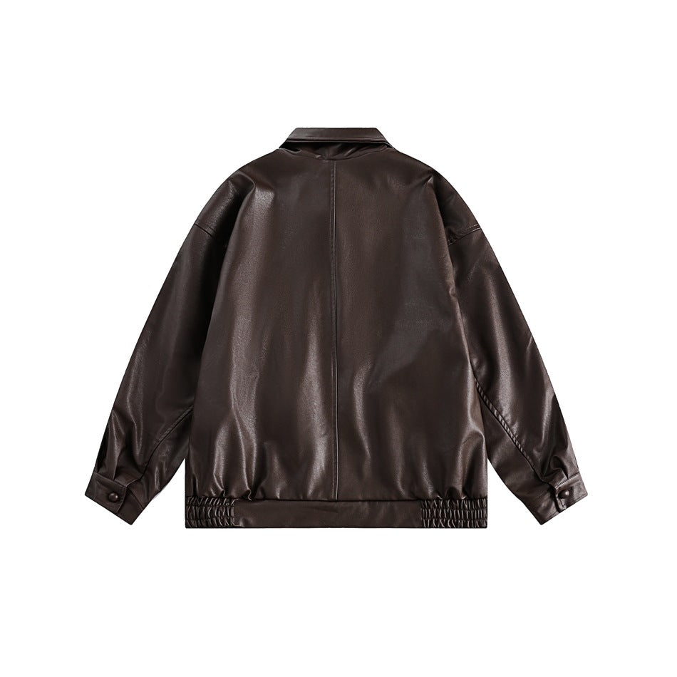 Back view of a dark brown jacket with a center seam, button cuffs and gathered sections at the hem.