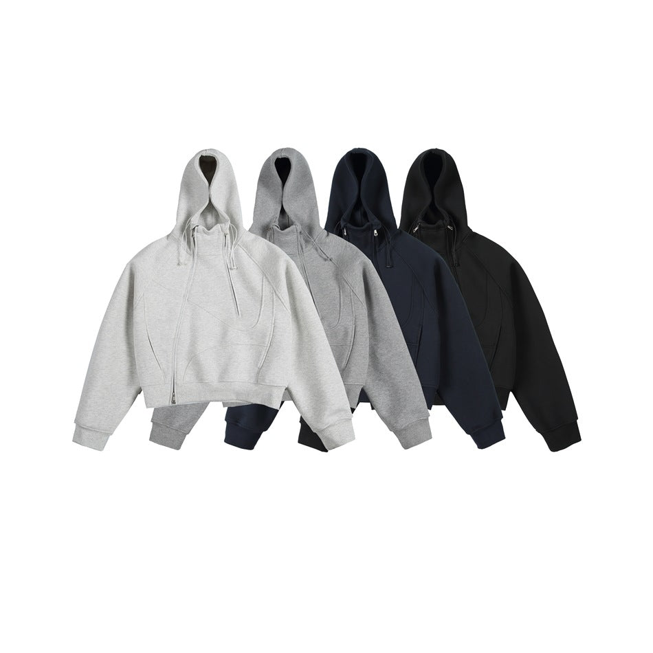 Four cropped zip hoodies with drawstrings shown together in white, heather gray, navy, and black.