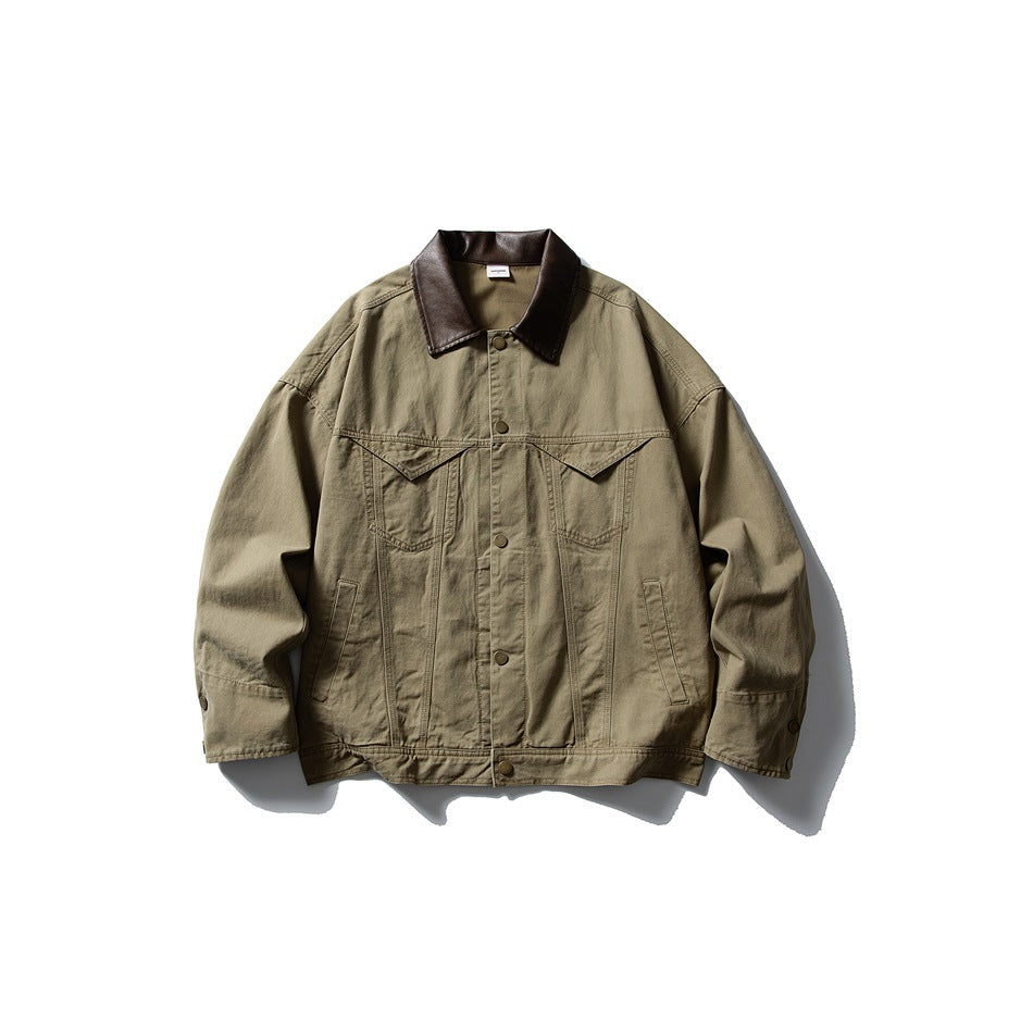 Khaki jacket with brown leather-look collar, snap front, chest flap pockets and snap cuffs, flat lay front view