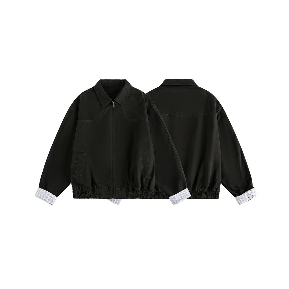 Black collared zip jacket shown from front and back, with angled pockets, elastic hem, and checked cuffs.