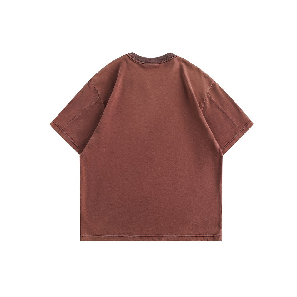 Back view of a plain muted burgundy short-sleeve T-shirt displayed flat on a white background.