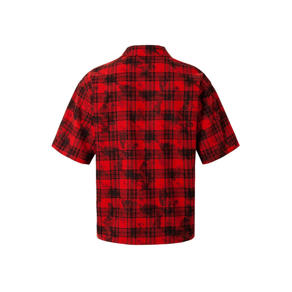 Back view of a red-and-black plaid short-sleeve shirt on a white background.